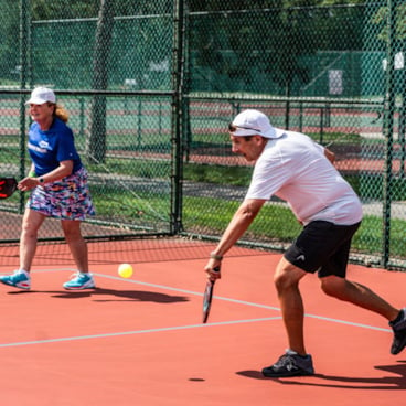 Discover the hottest new sport taking the country by storm - Pickleball! 