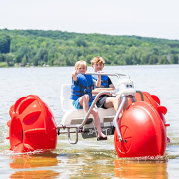 Kids riding an aqua cycle