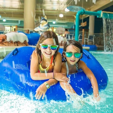 Girl going down waterslide 