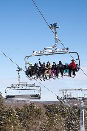 Female skier going down slope