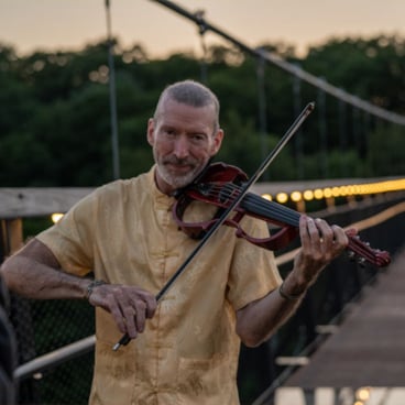 Dixon's Violin playing on SkyBridge Michigan